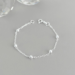 Pulseira Infantil 5 Bolinhas de Prata: brilho e encanto para os pequenos.